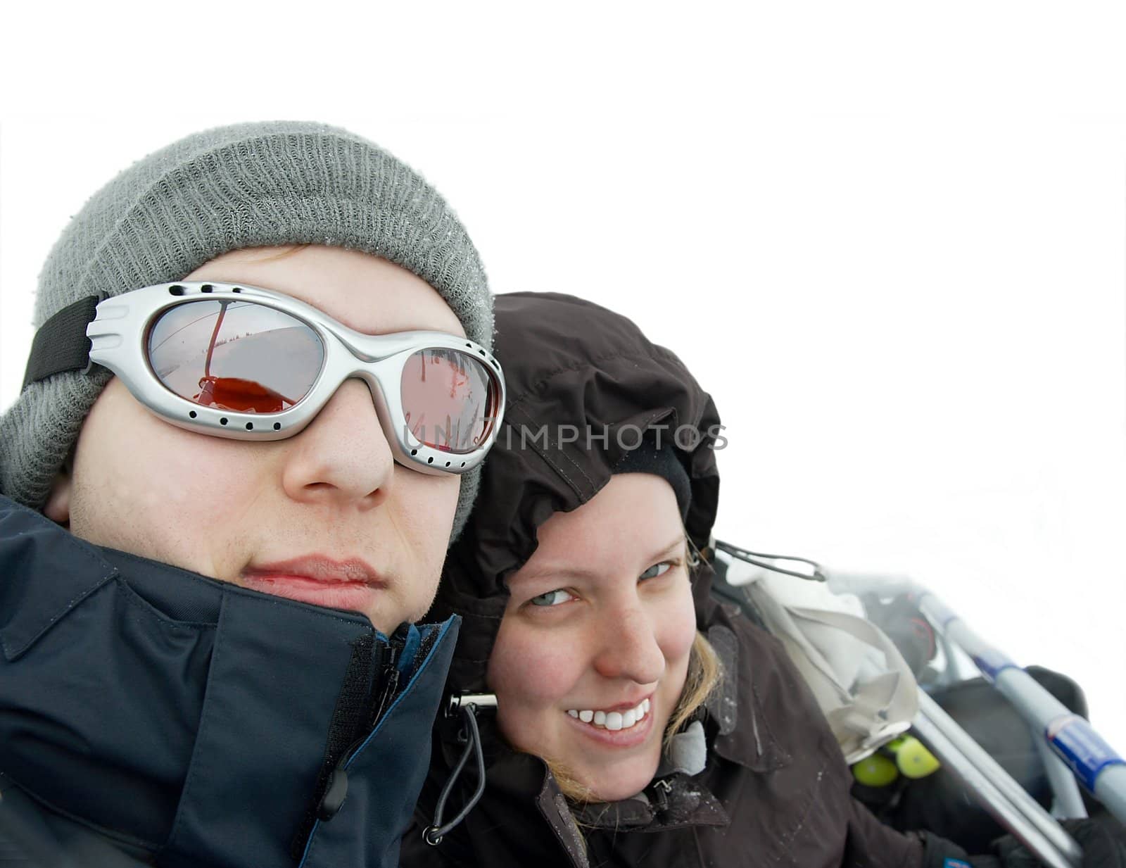 Young couple in a ski lift