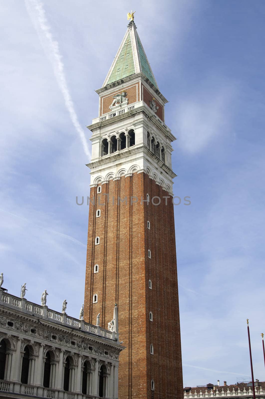 St Mark's Campanile over blue sky in Venice, Italy