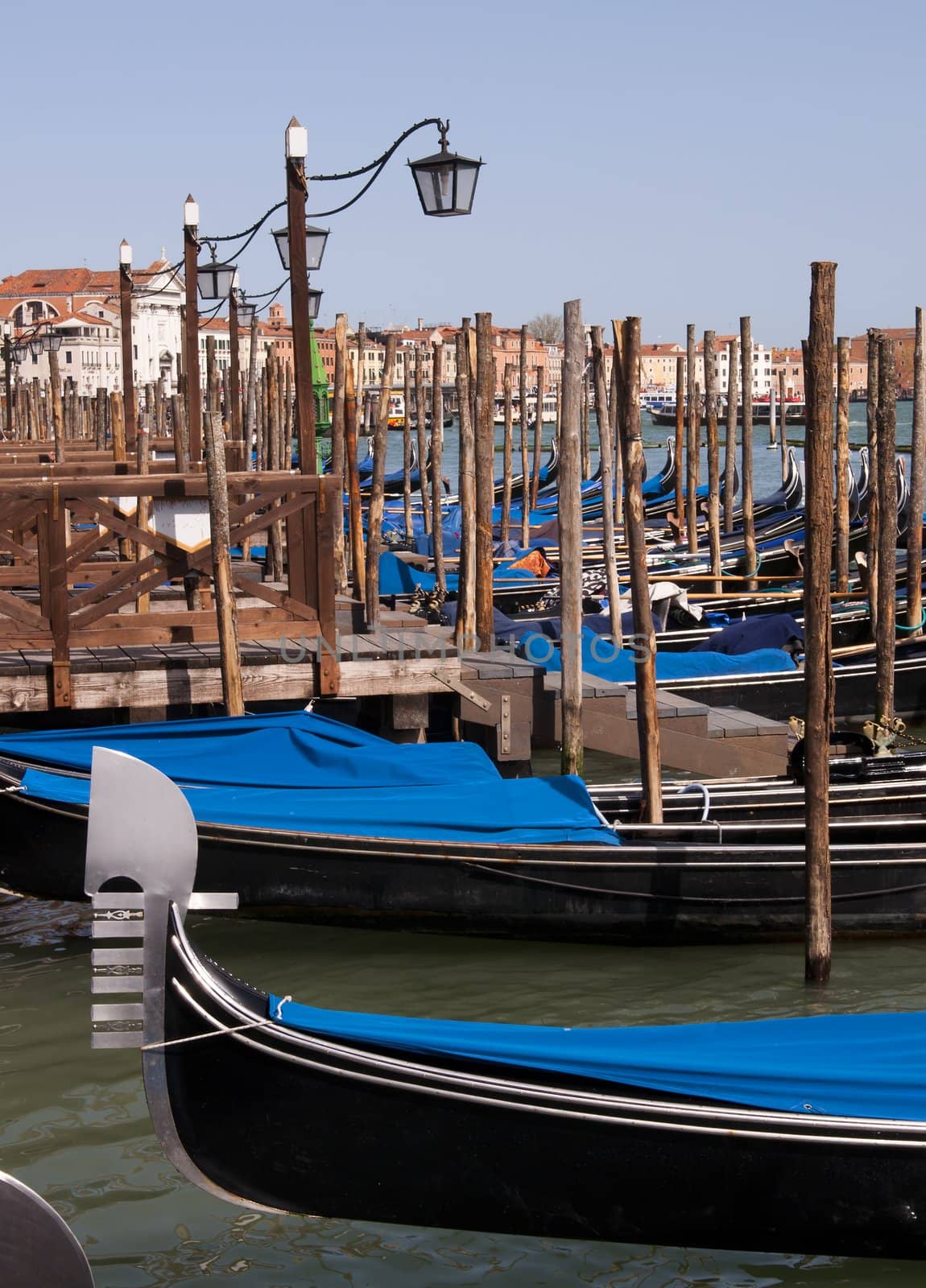 Many parked famous gondolas in Venice, Italy