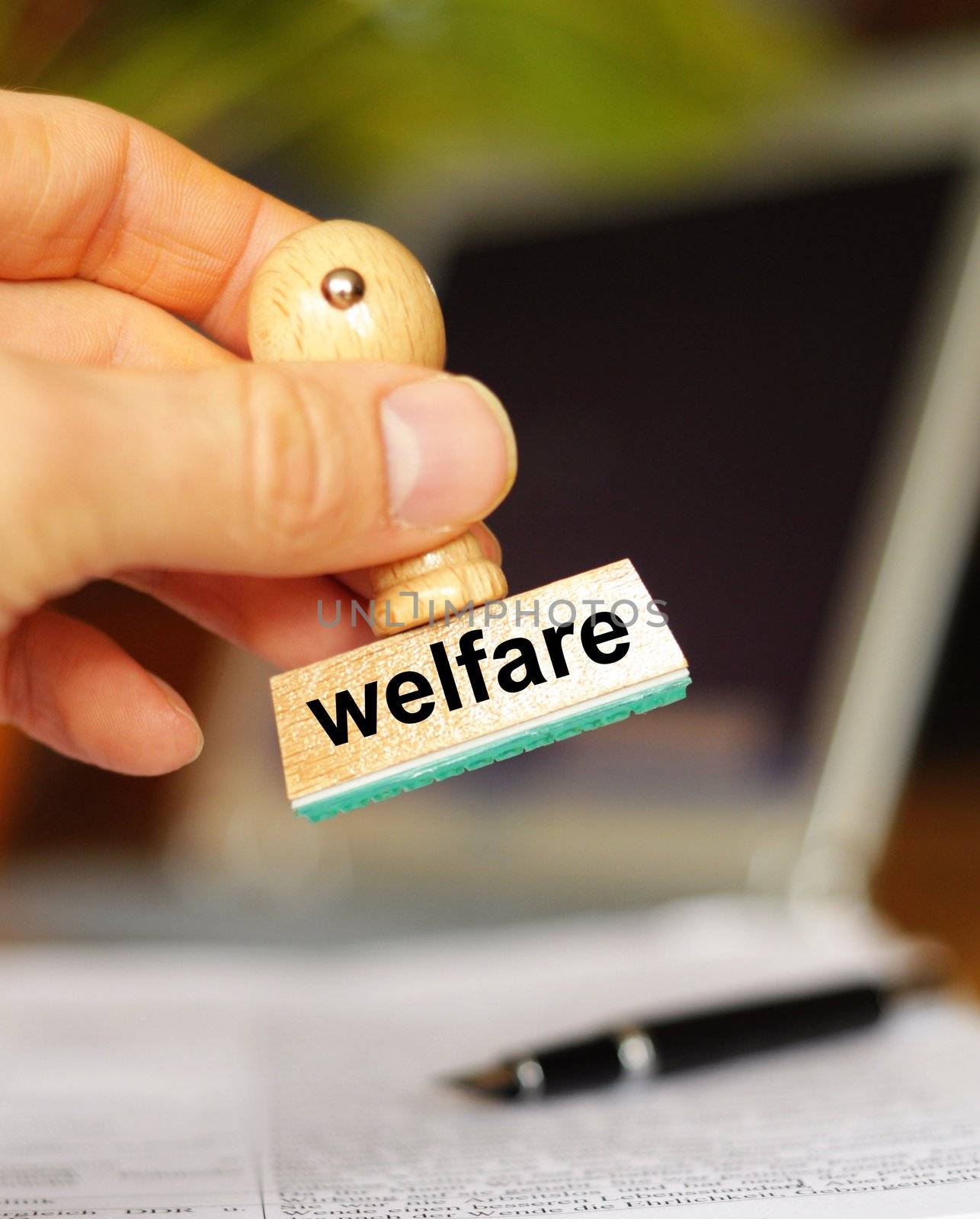 social welfare concept with stamp in office or bureau and copyspace