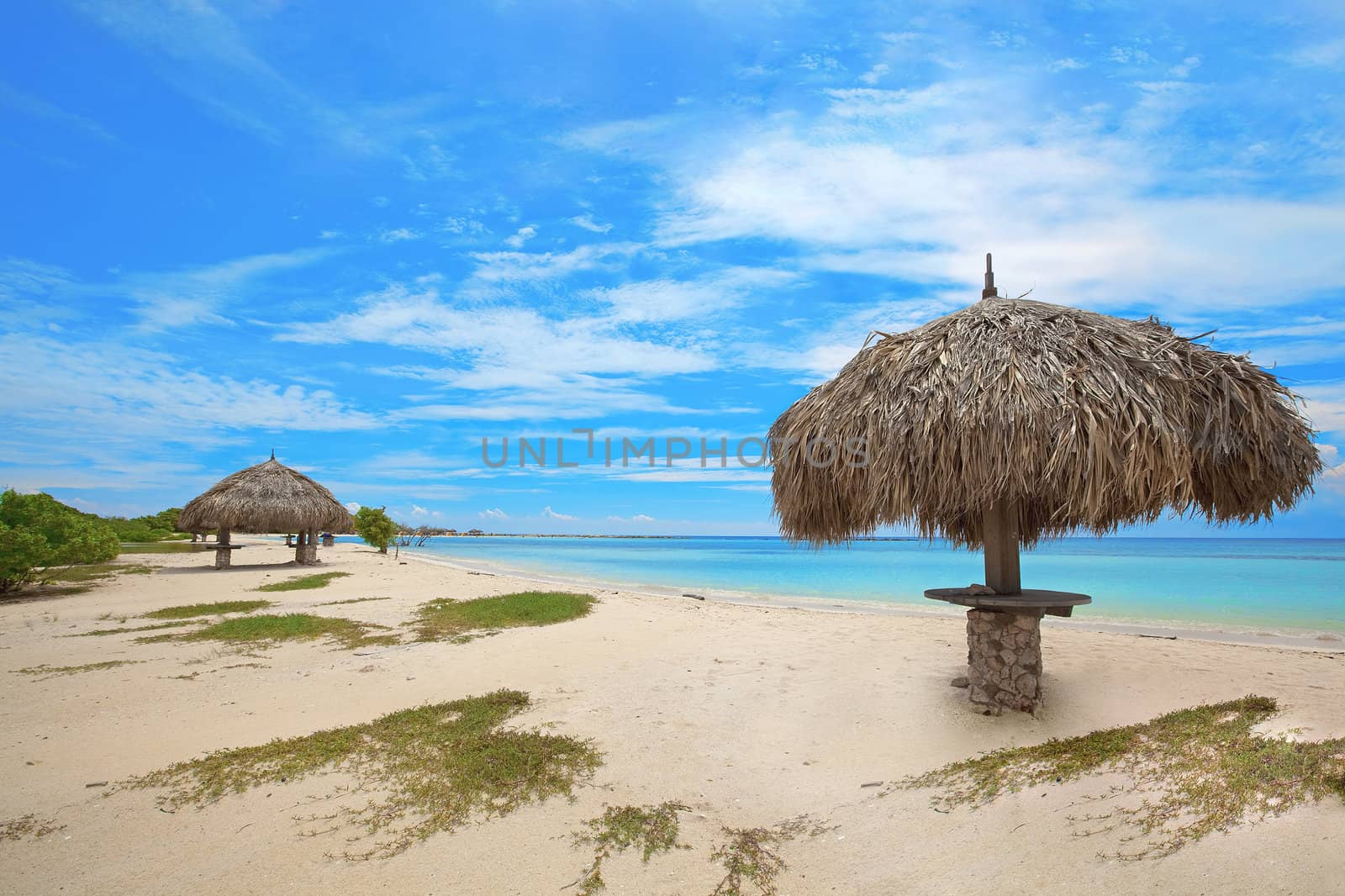 Turquoise water and beach hut on Baby beach, Aruba