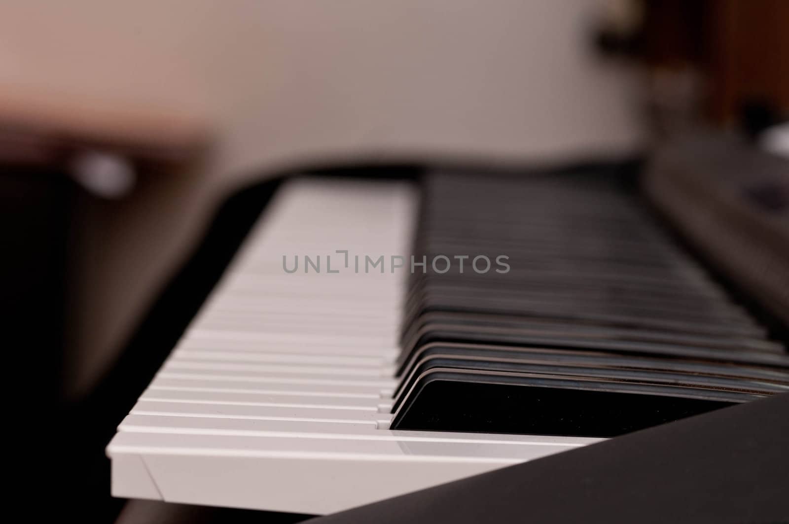 close up shot of black and white keys of a piano