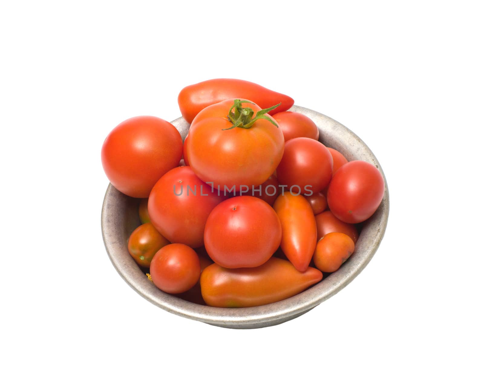 Tomatoes in an aluminum bowl, isolated on a white background.