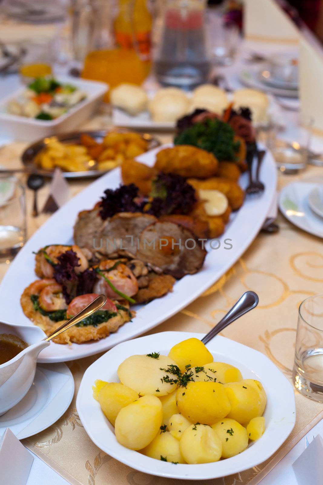 Different appetizing food from table at the wedding reception 
