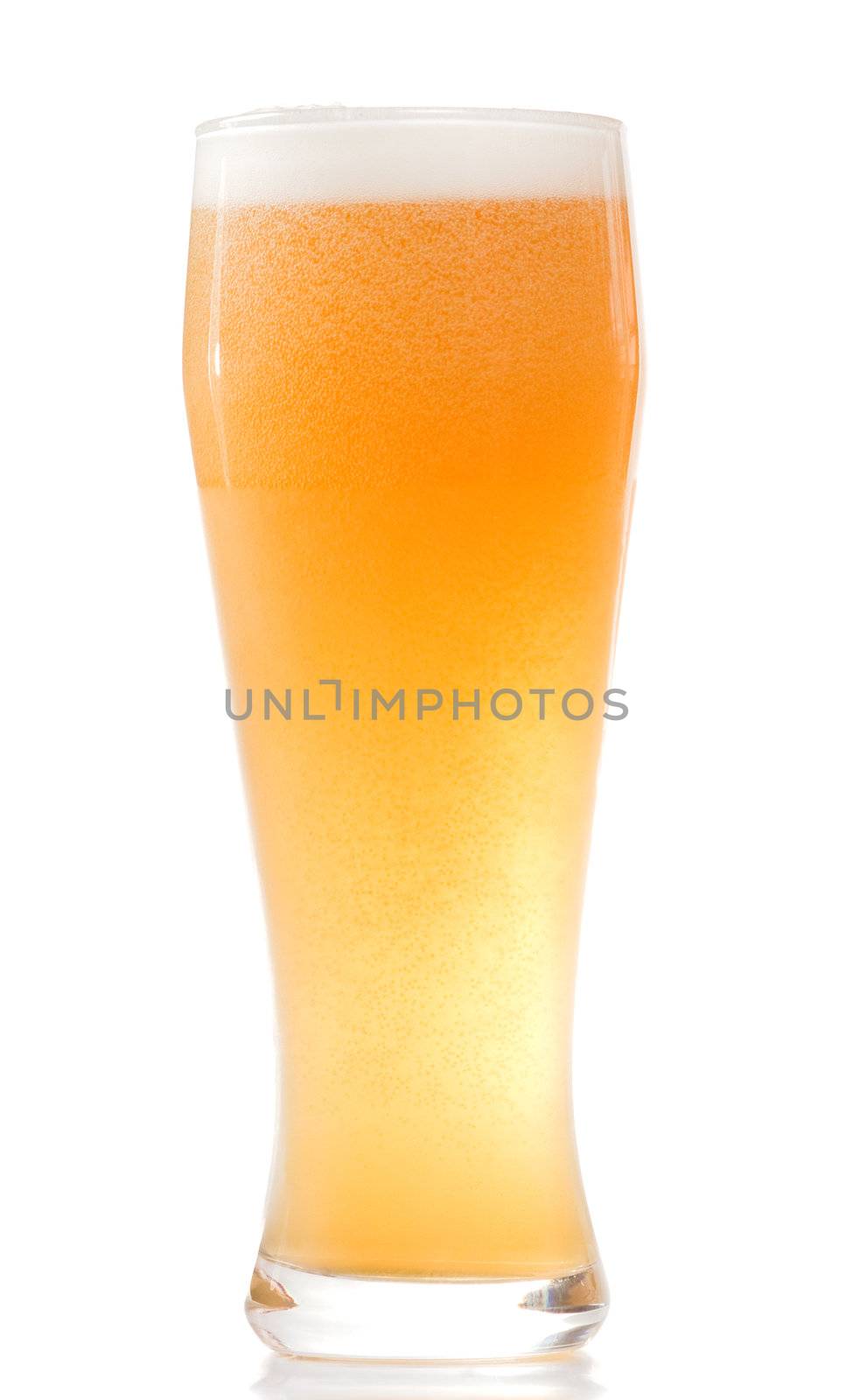 Full misted glass of beer isolated on white background.