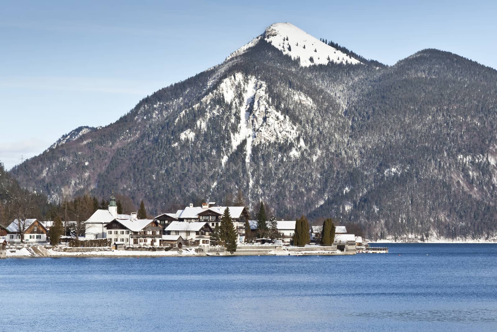 An image of the Walchensee in Bavaria Germany covered in snow