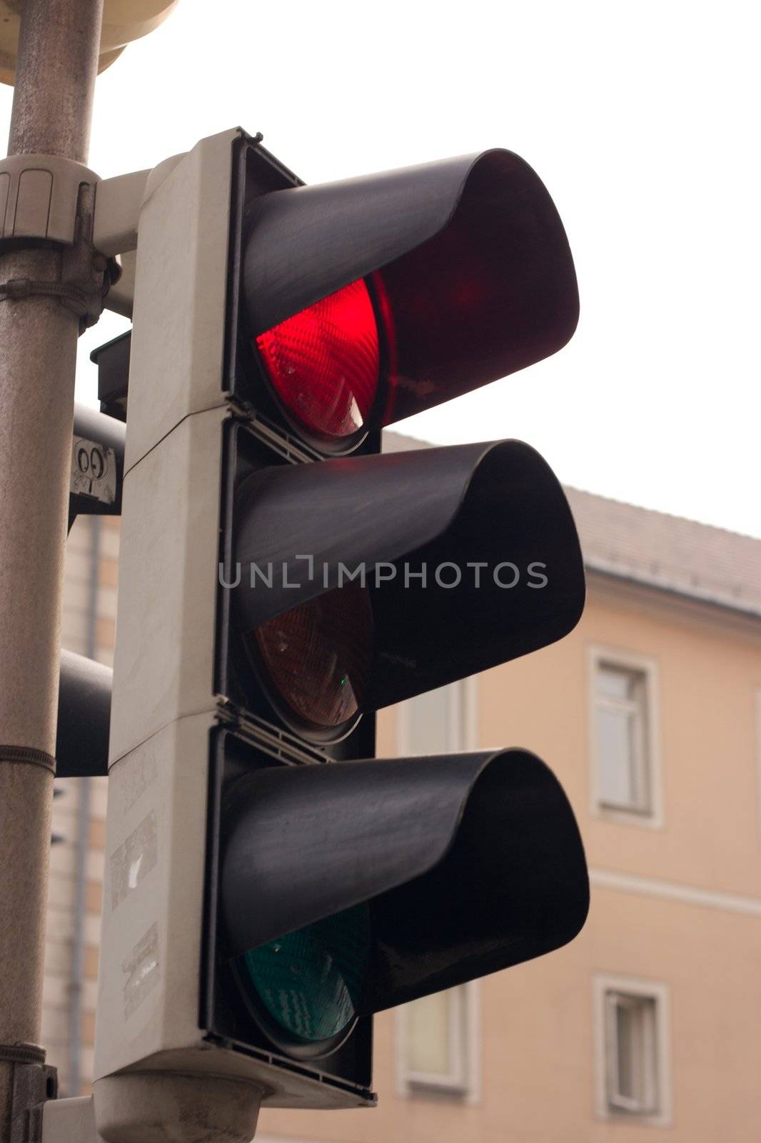 Closeup of a red traffic light in the street