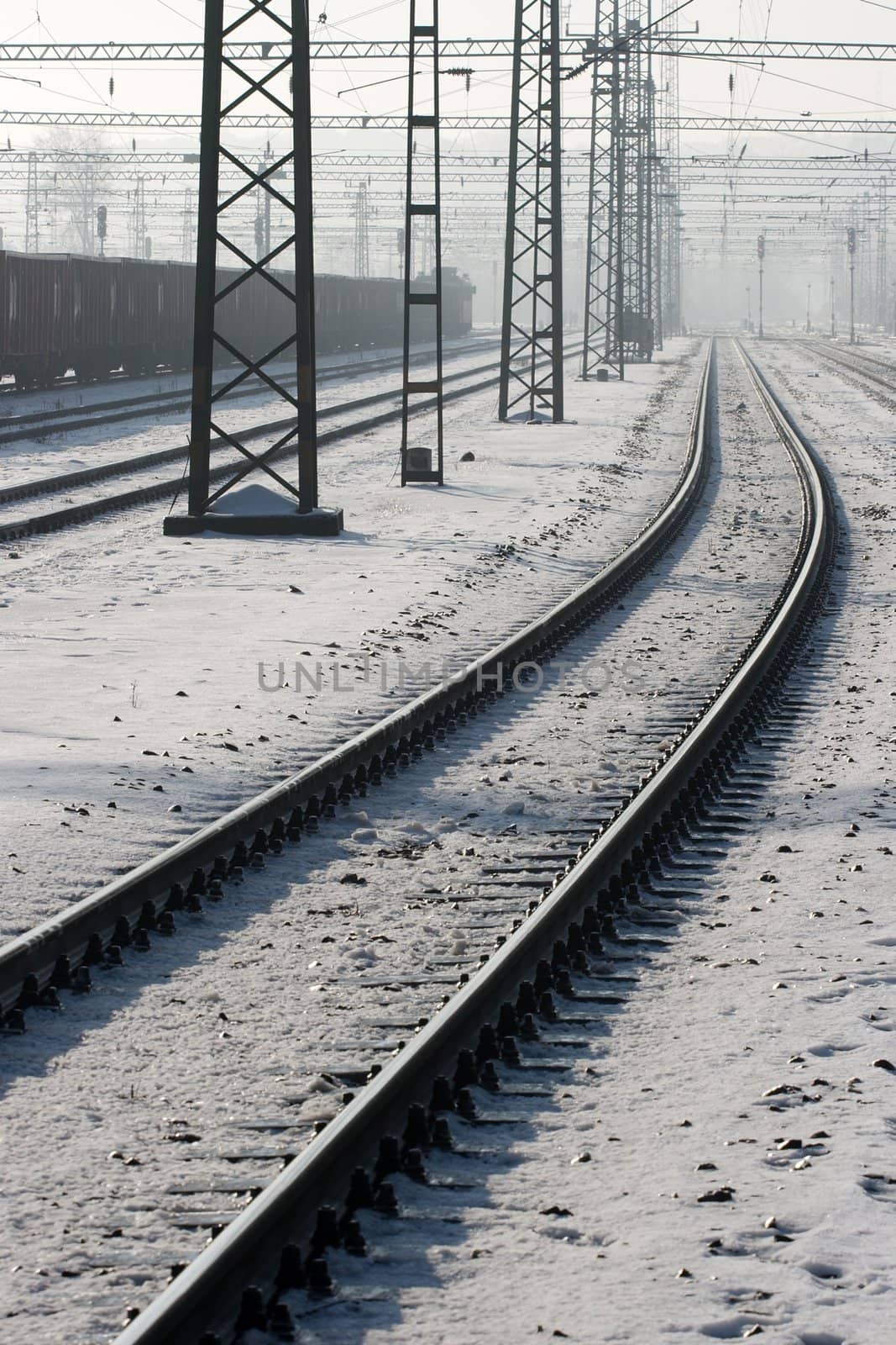 Snowy railway tracks in winter