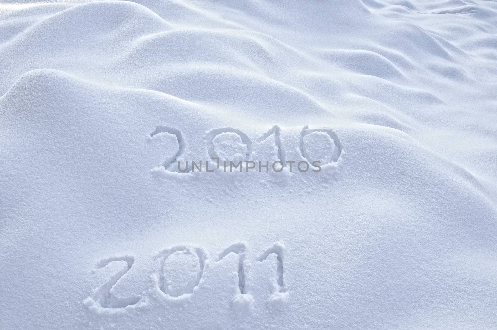 Year 2010 and 2011 written in Snow