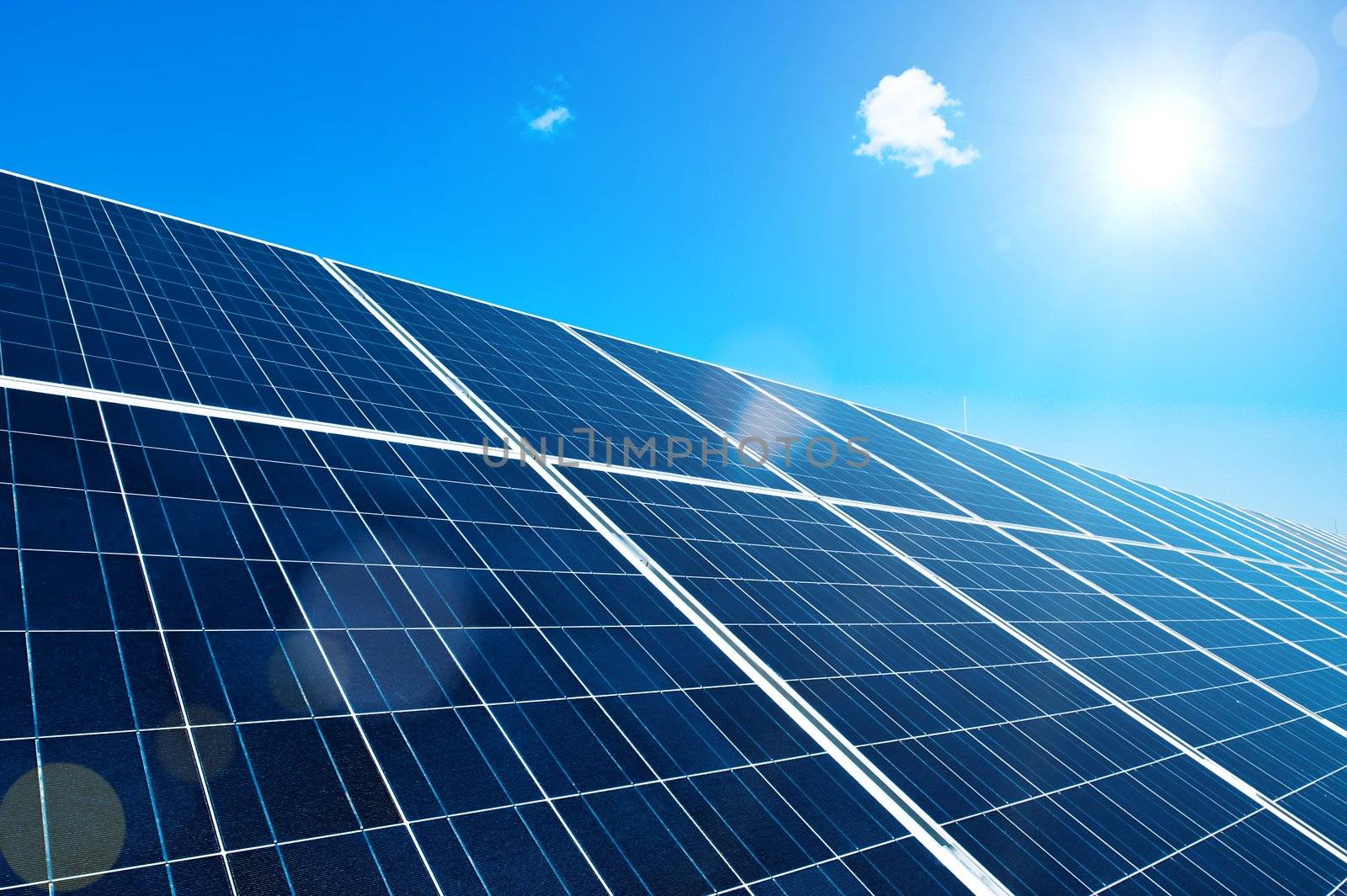 Solar Panel with Sun and Lens Flares and blue Sky