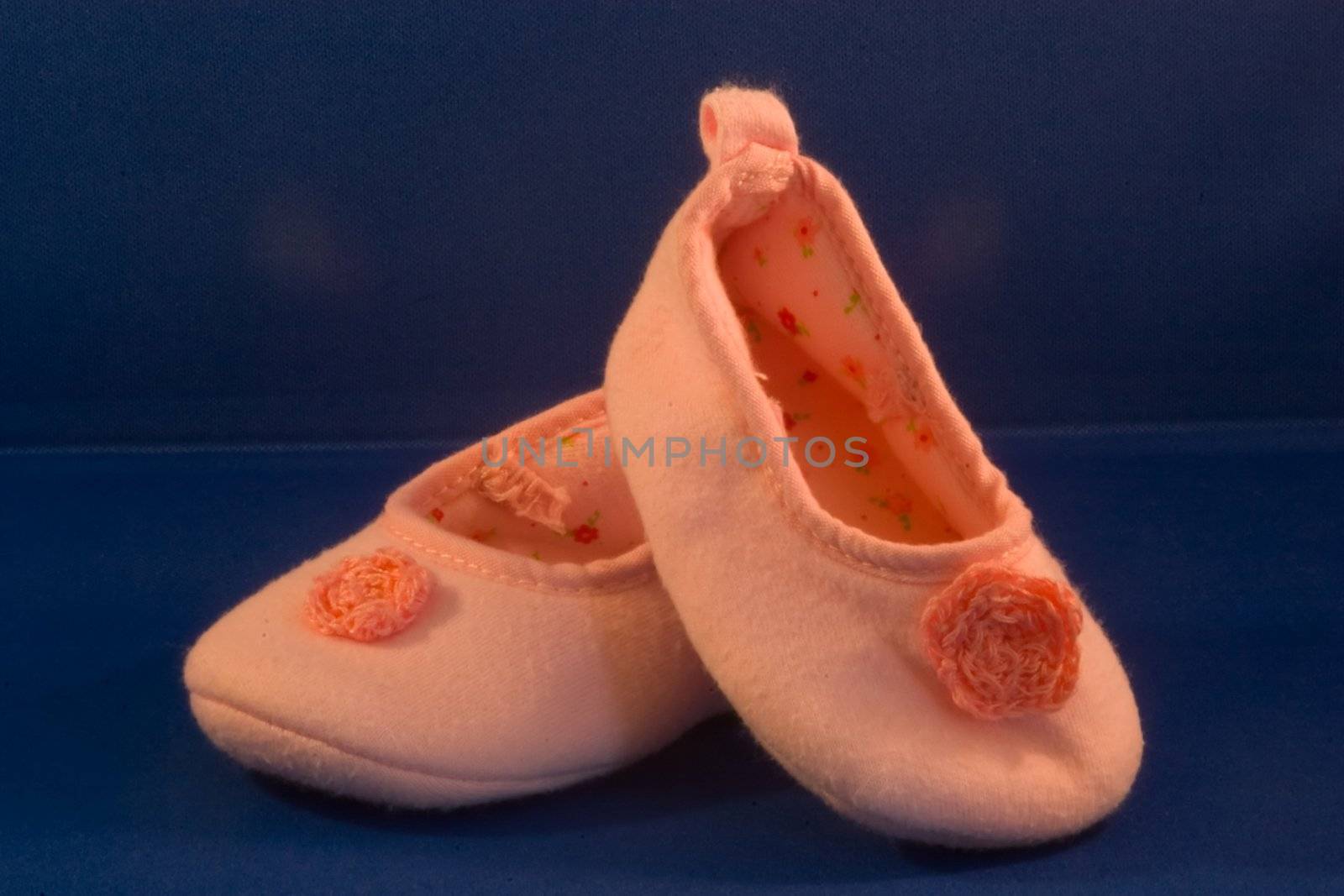 Pink baby shoes for a girl