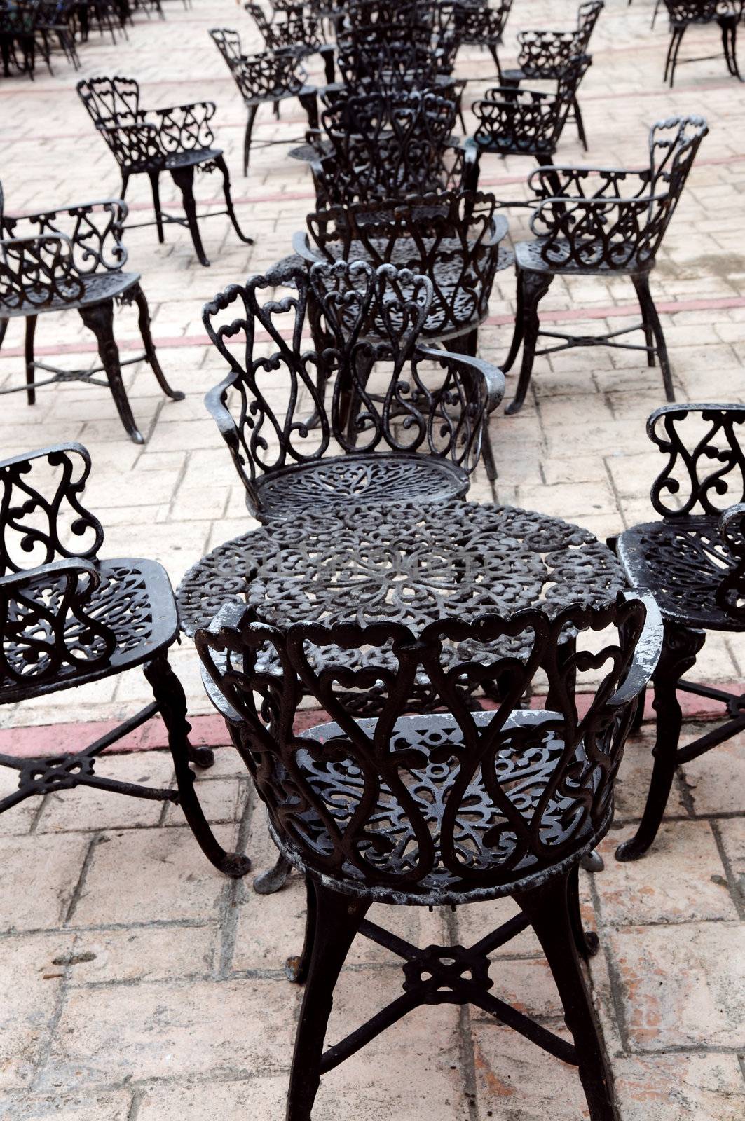 Wrought iron furniture on the outdoor cafe patio