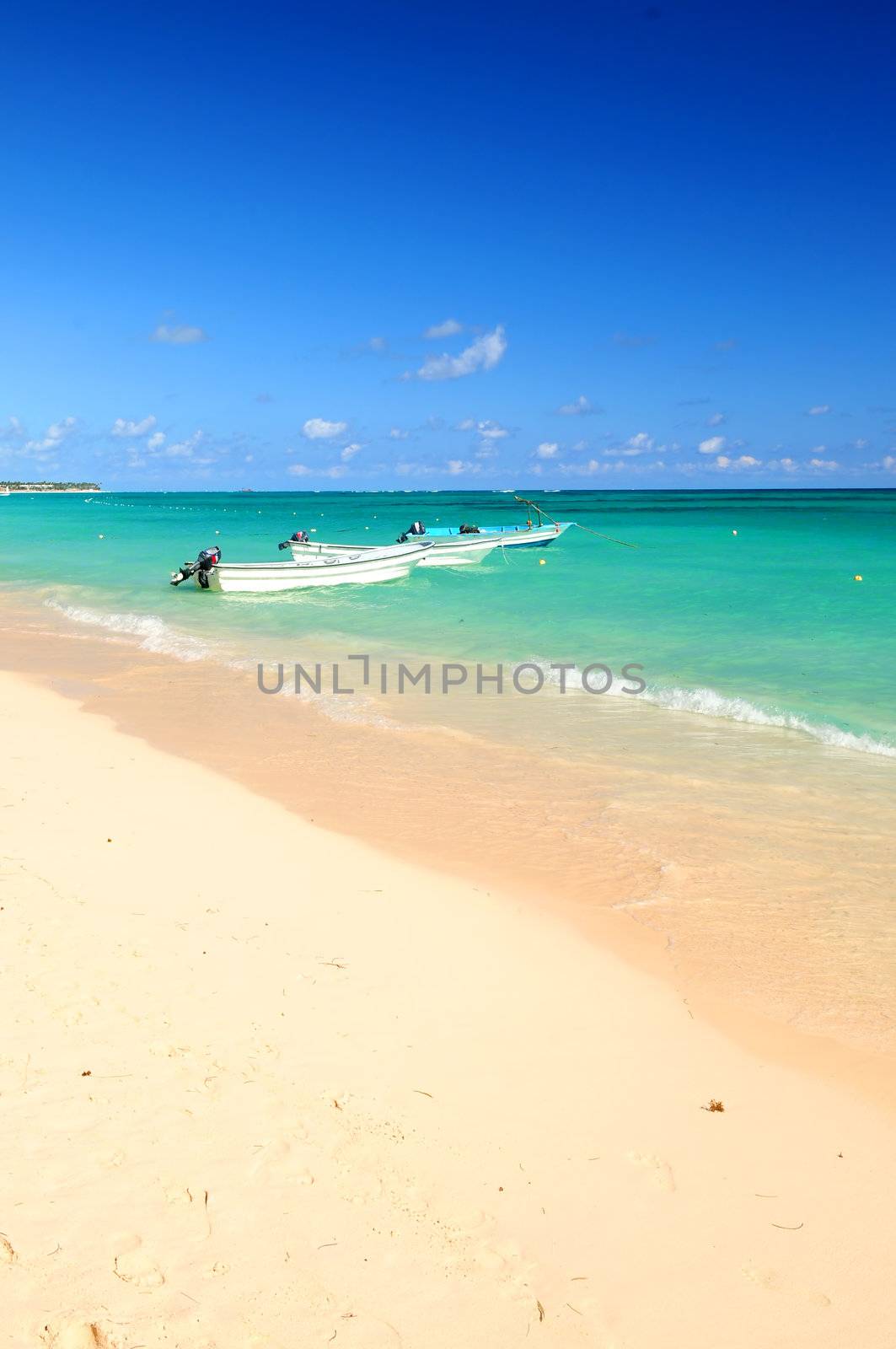 Fishing boats in Caribbean sea by elenathewise