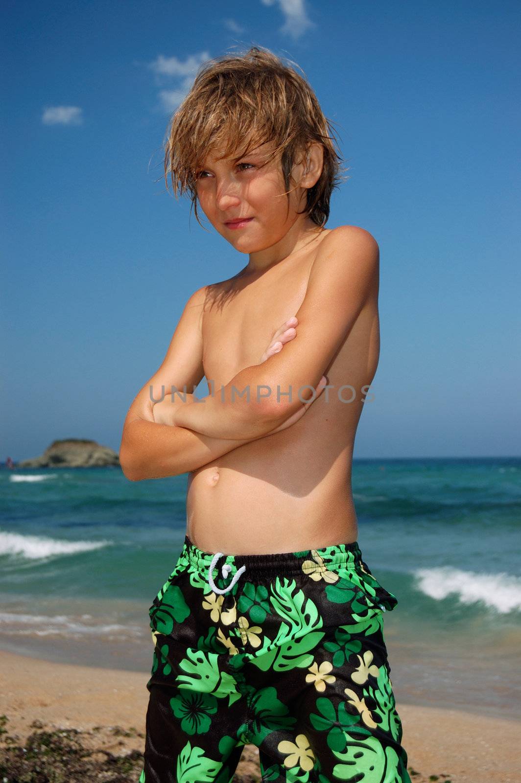 sunburn boy at the beach