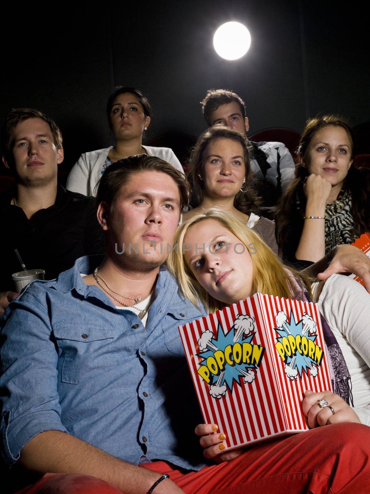 Young couple on a date at the movie theater