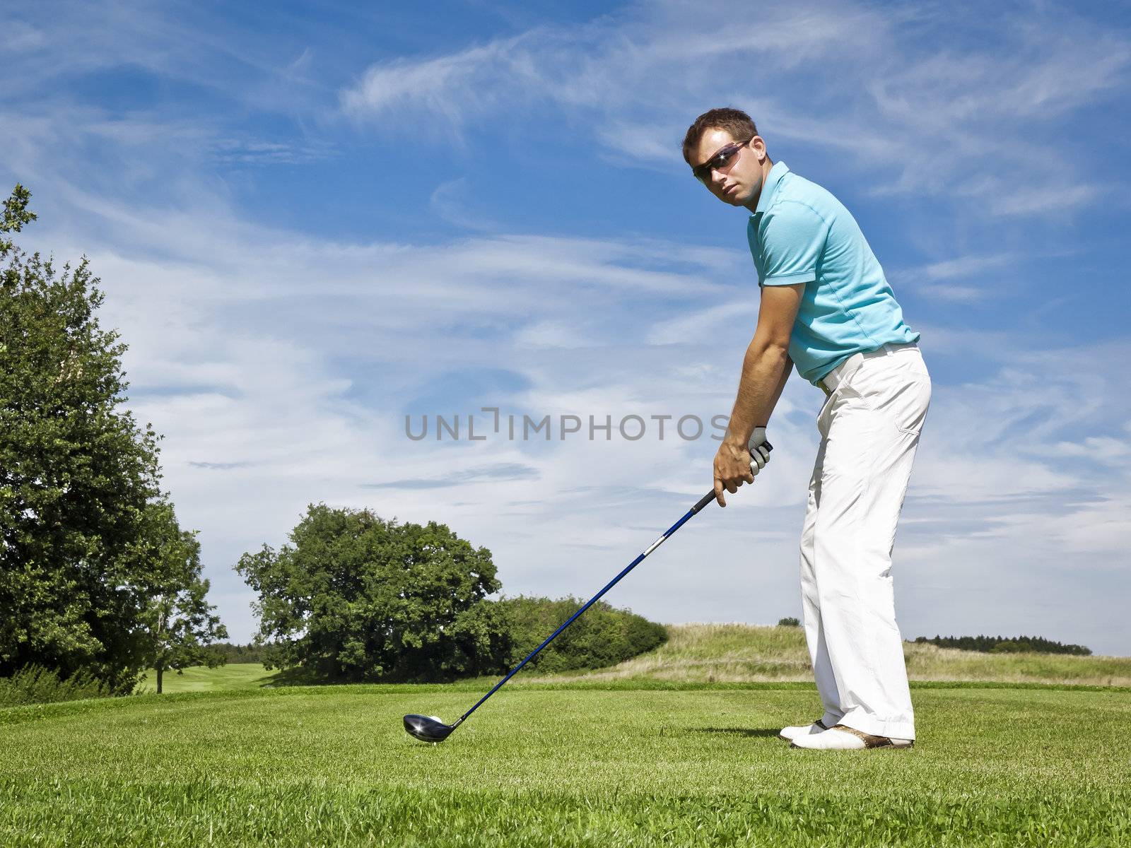 An image of a young male golf player