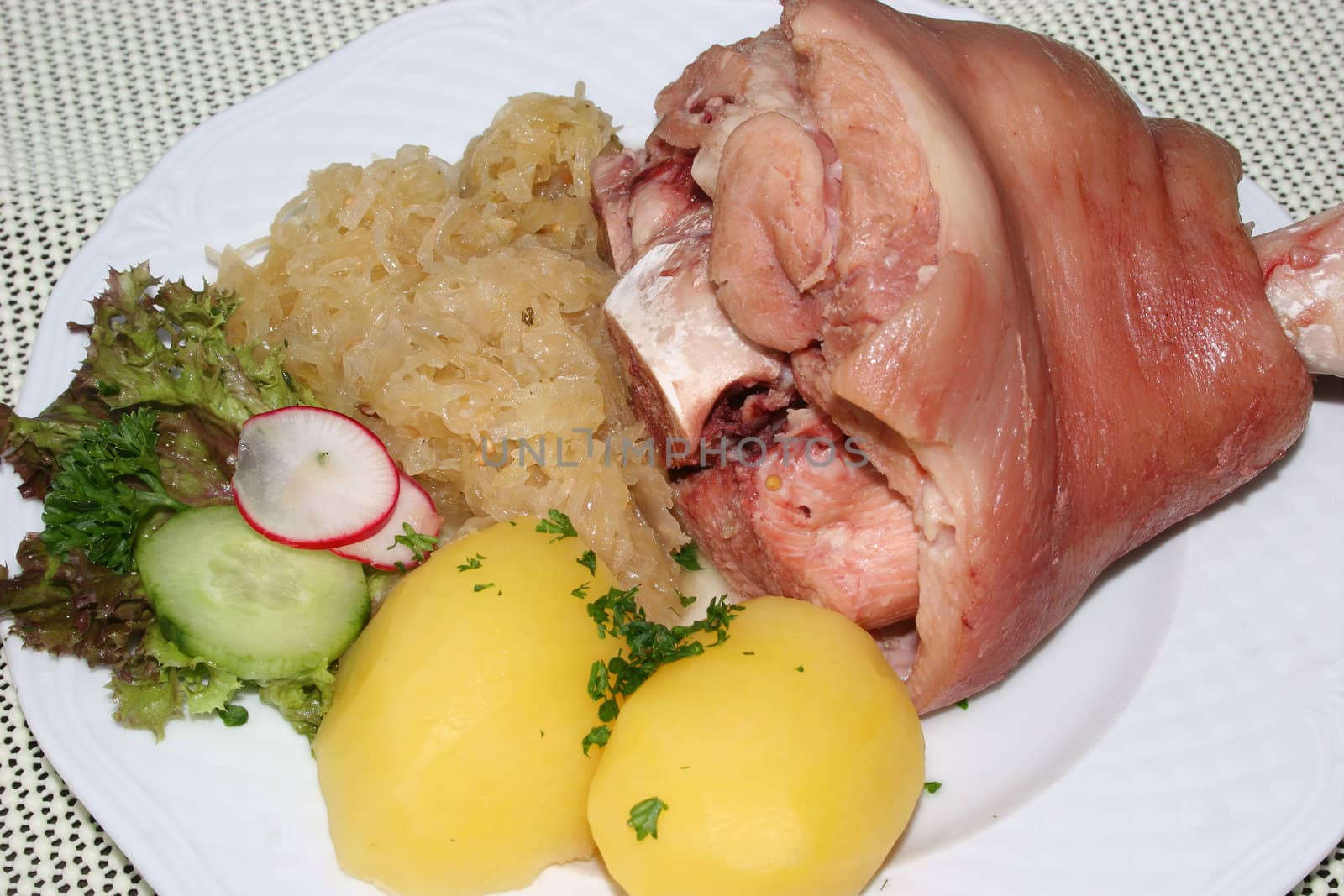 Pork with cabbage, potatoes  and salad
