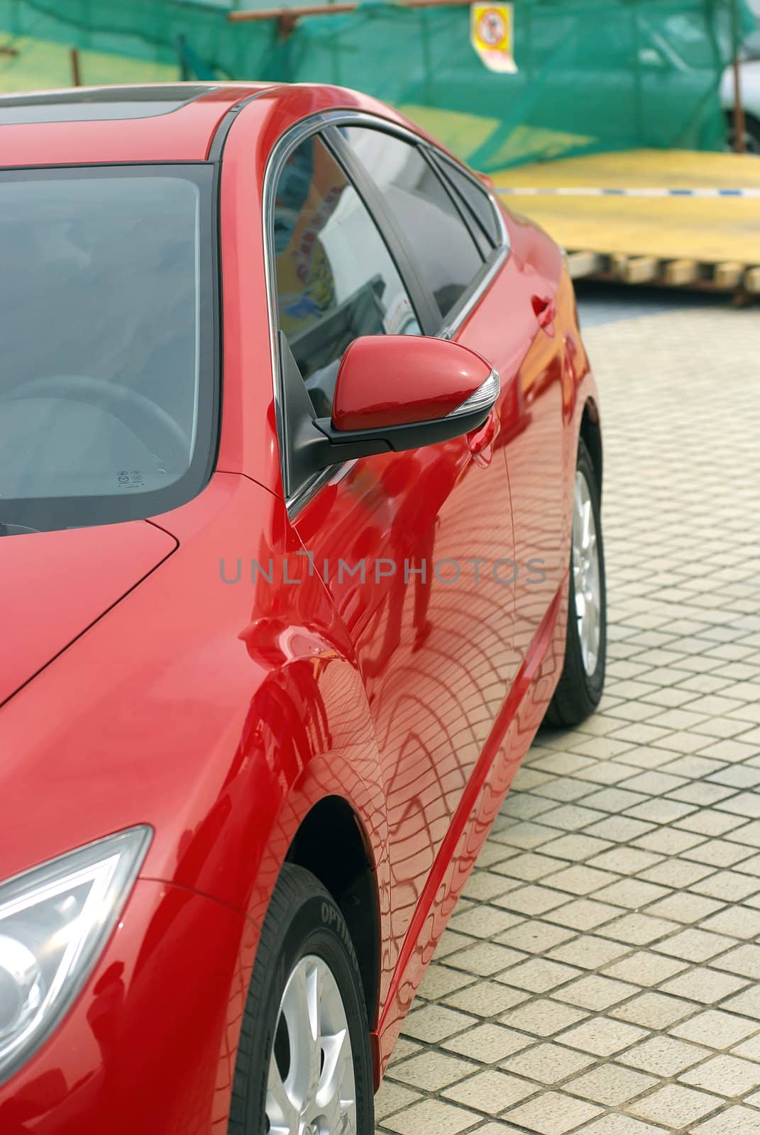 Red car on display at the exhibition