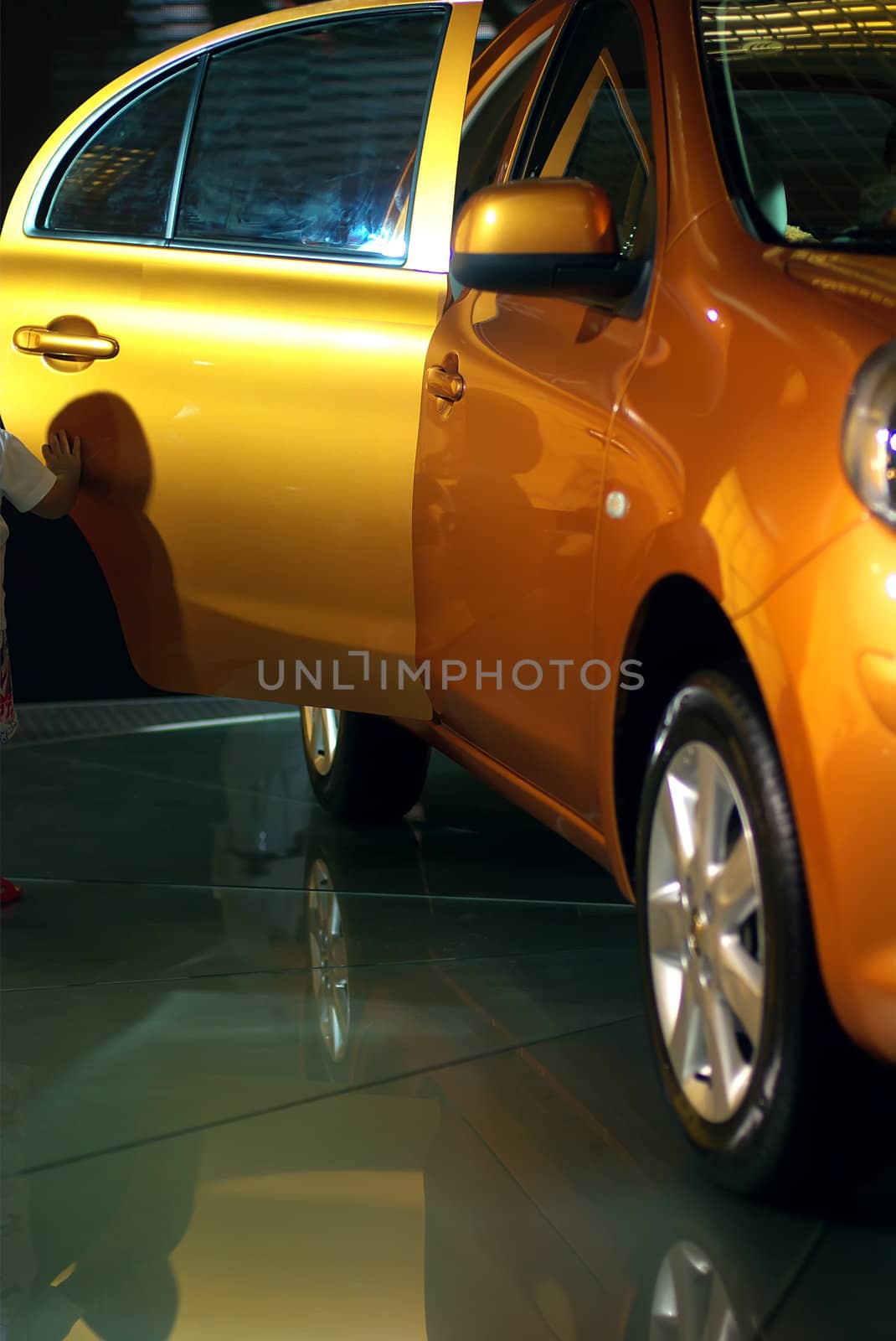 Yellow car on display at the exhibition