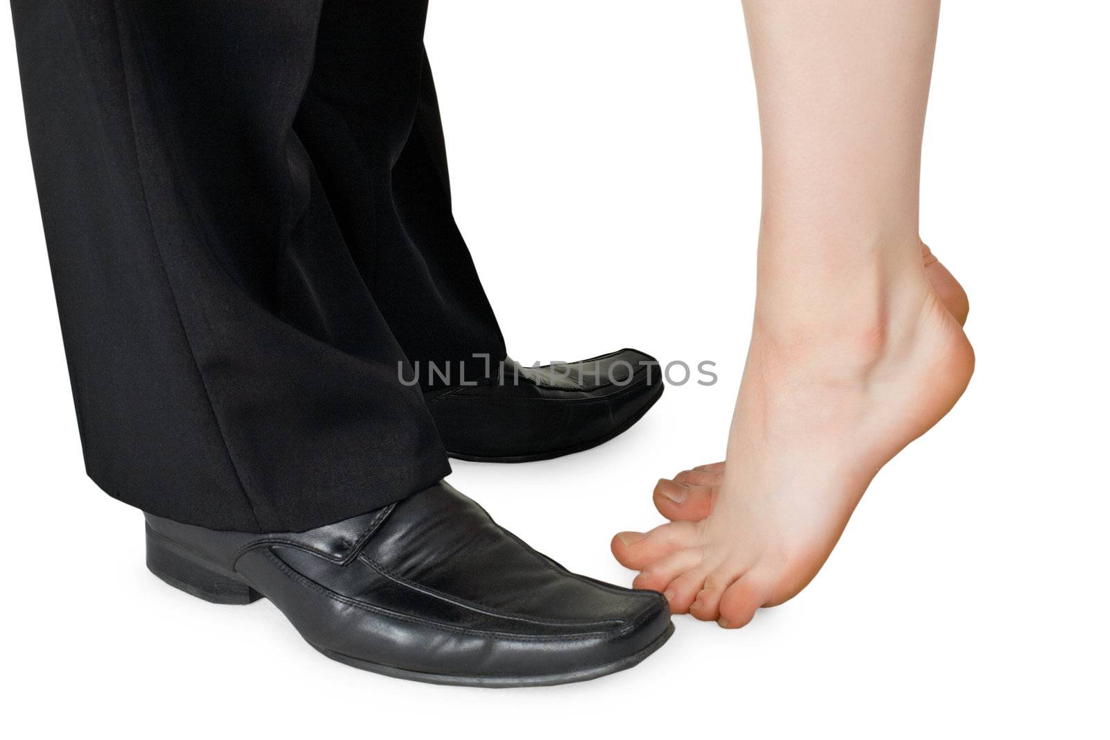 Feet kissing a man and a naked woman isolated on white