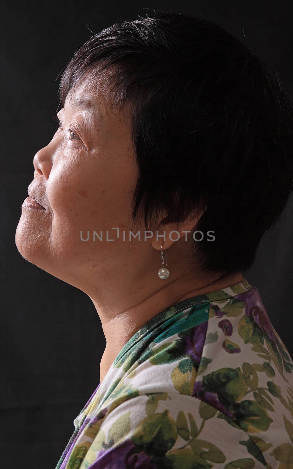 asian woman on black background 