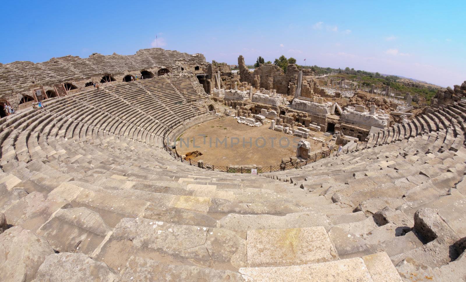 The ruins of the ancient amphitheater. Turkey, Side. Amid the ruins - ancient columns.