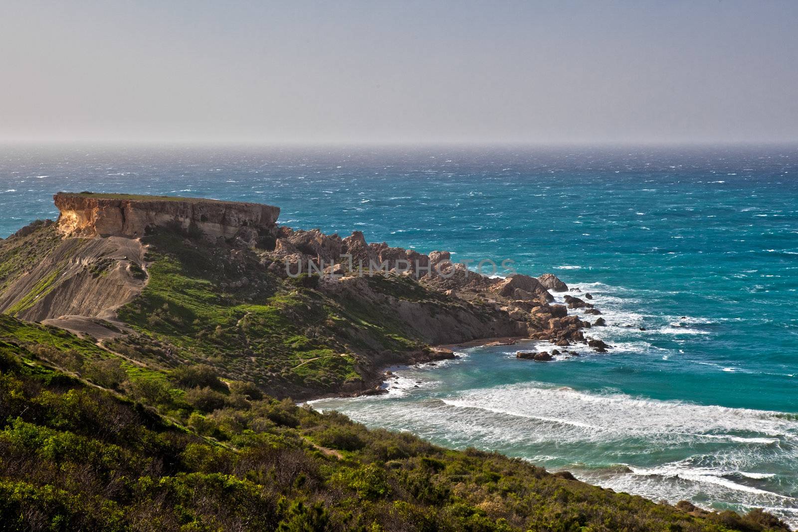 Ghajn Tuffieha Bay is one of the most beautiful and idyllic beaches on the island of Malta,surrounded by unique scenery and within an area of high ecological importance