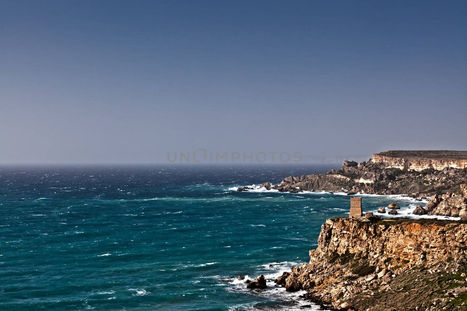 Ghajn Tuffieha Bay is one of the most beautiful and idyllic beaches on the island of Malta,surrounded by unique scenery and within an area of high ecological importance