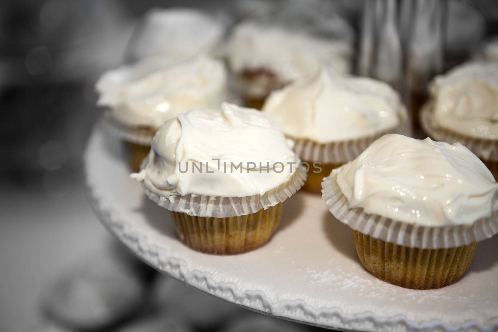 Close up of a wedding cupcakes on a serving tray
