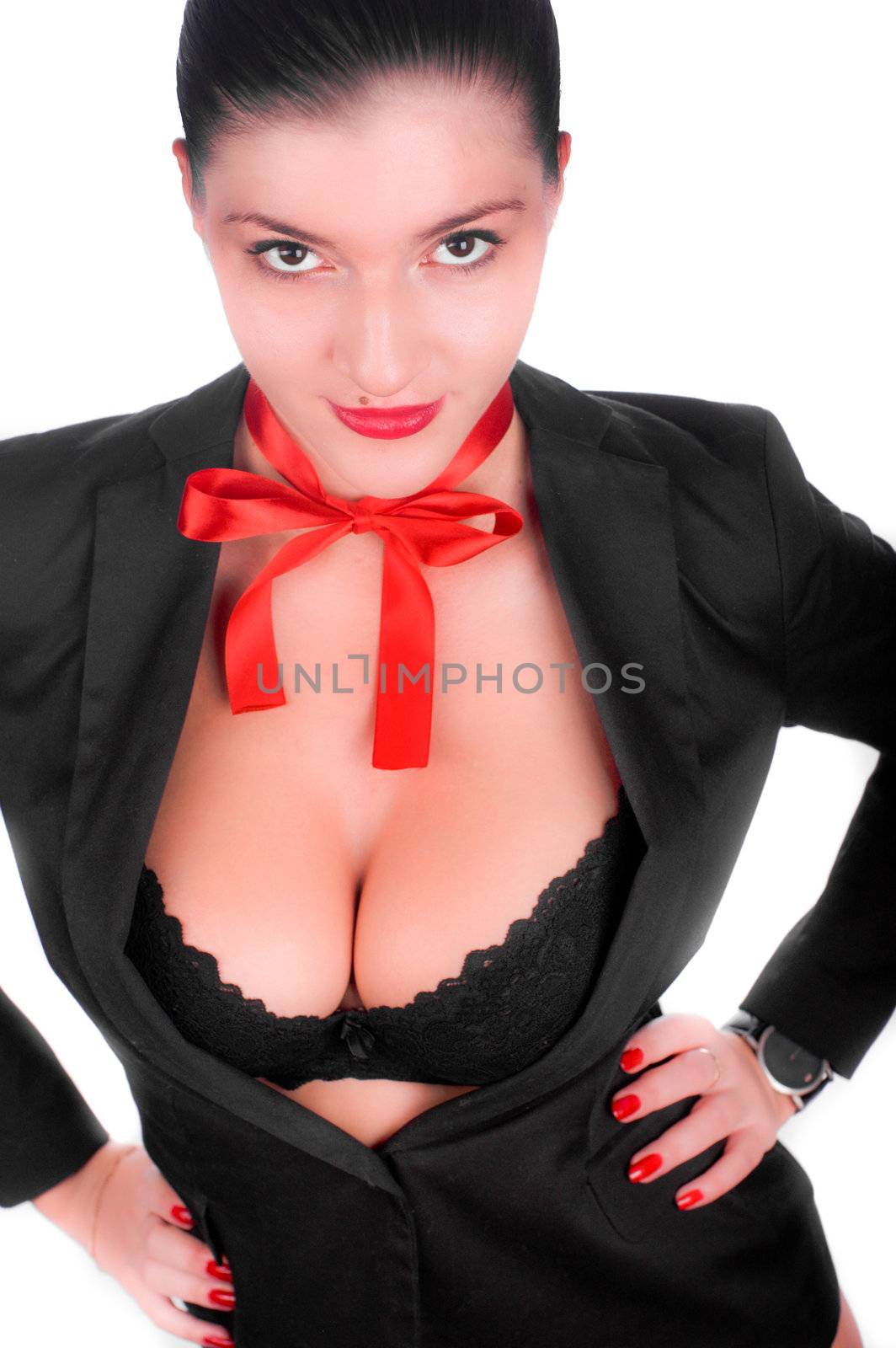 A beautiful sexy gril in a black anderwear with a red bow on her neck (isolated on white)