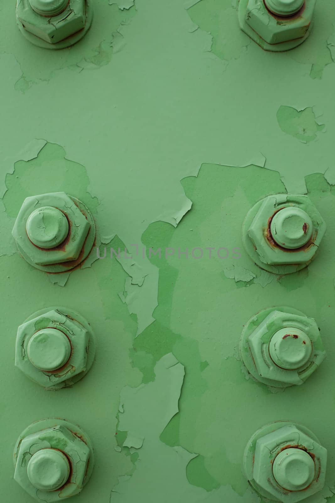 Painted bolts of steel structure (bridge) make abstract background texture