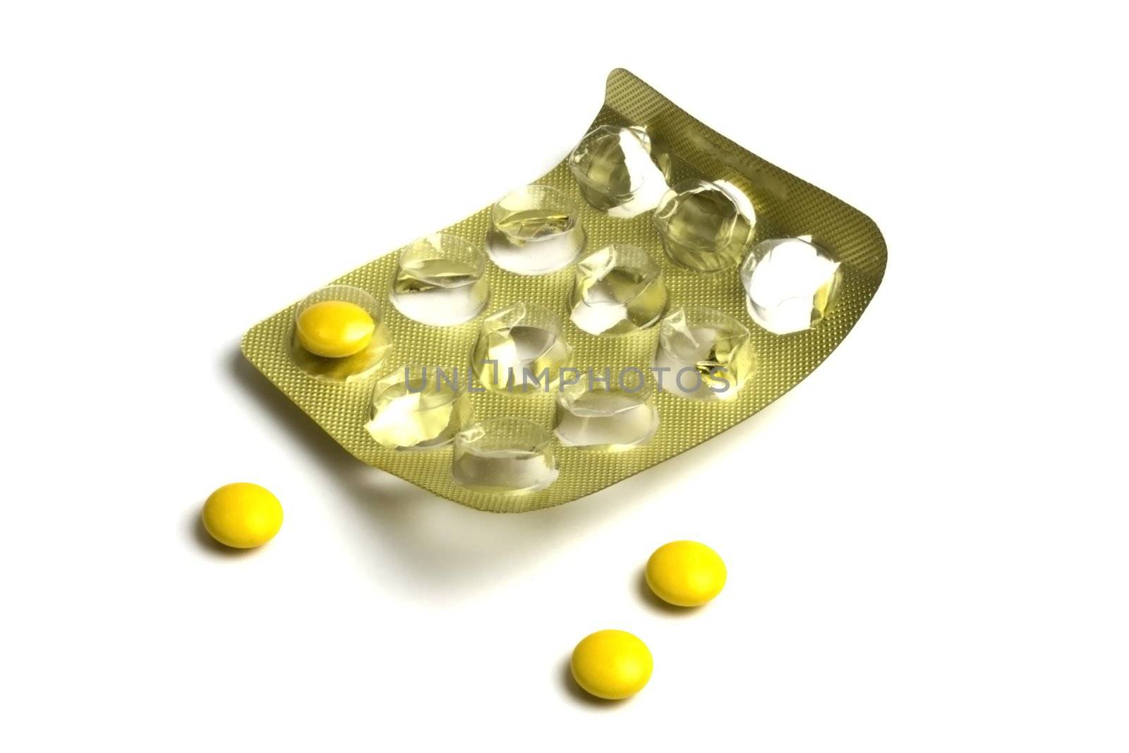 Package of Yellow Pills isolated on white