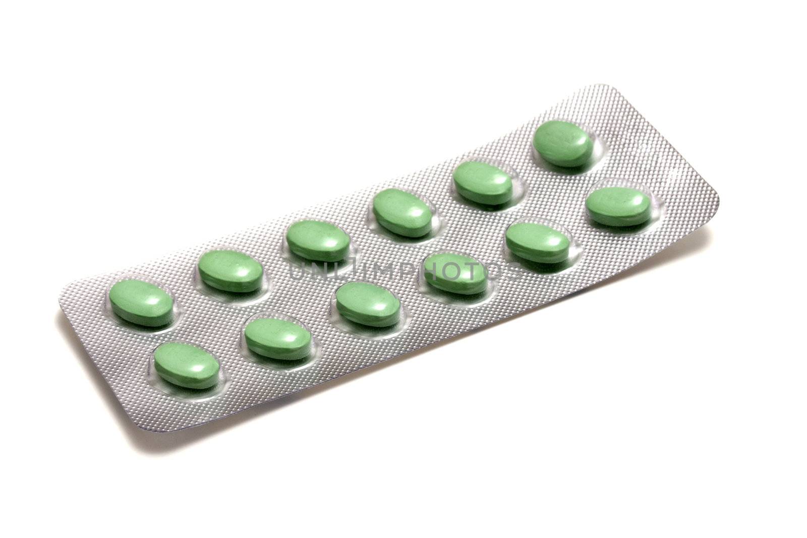 Set of green pills