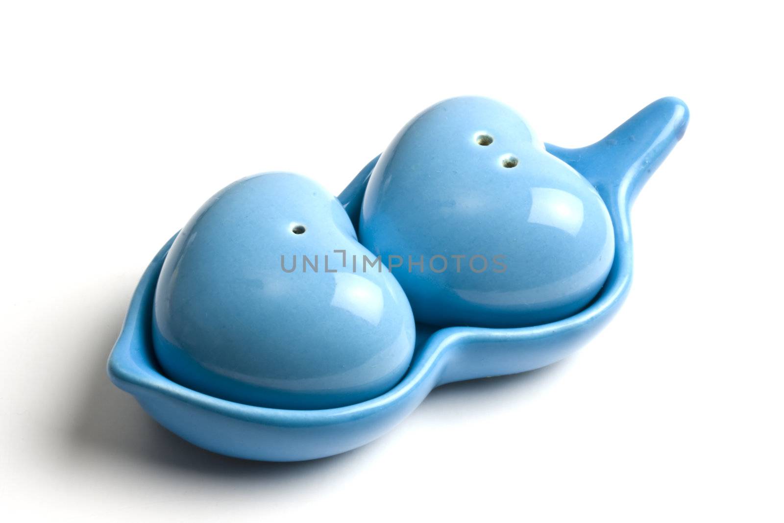 Lovely shaker set of salt and pepper isolated on white