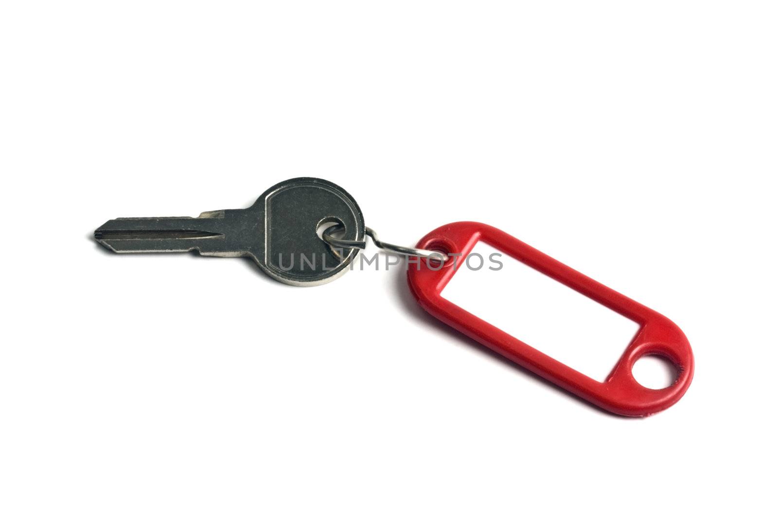 Blank tag and a key isolated on white 

