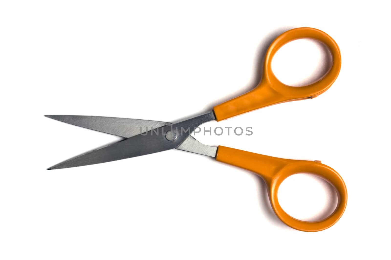 Orange scissors isolated on white background 