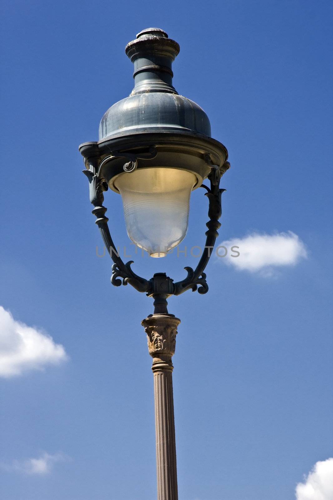 Paris Street lamp isolated on blue sky
