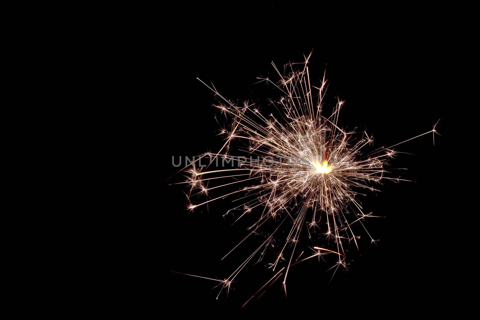 Lights from sparkler isolated on black background