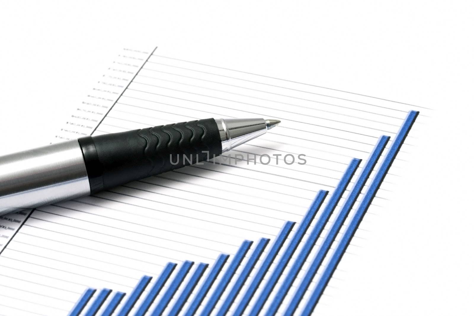 Business graph and a pen