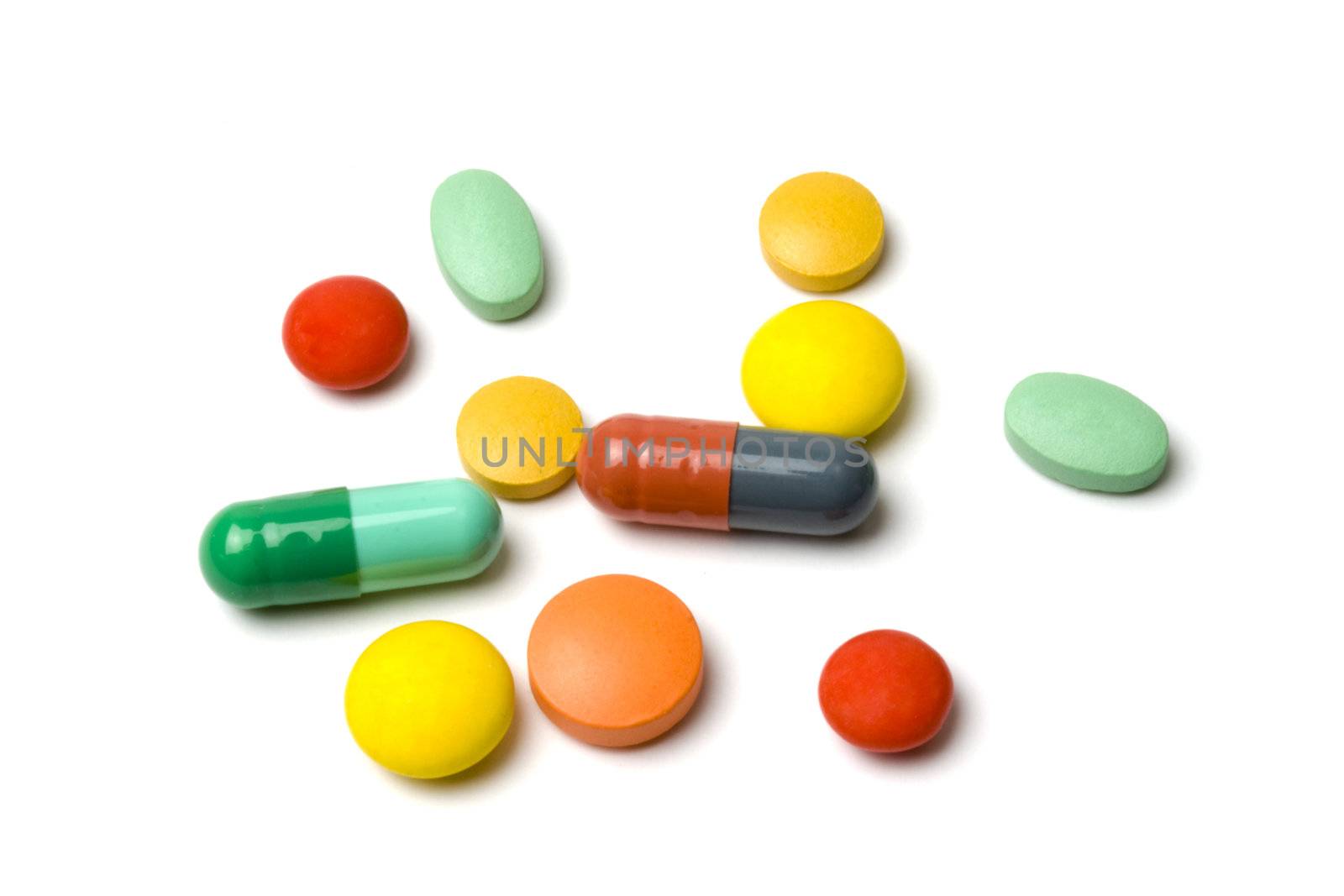 Colorful pills isolated on white background