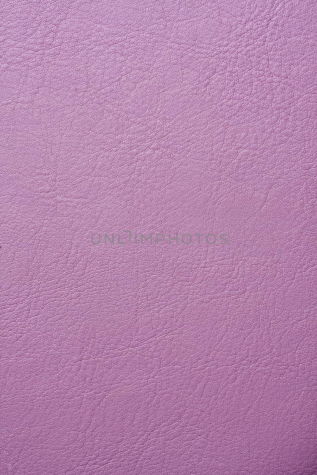 Pink leather texture background Closeup. 