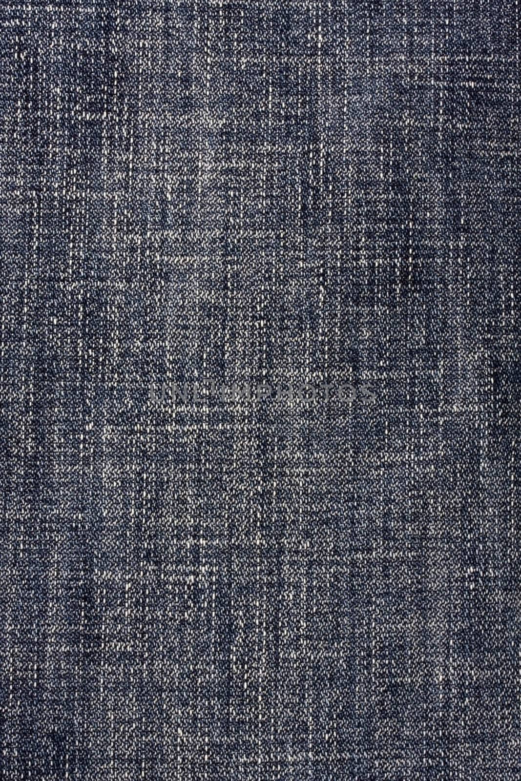 Texture of blue jeans background closeup