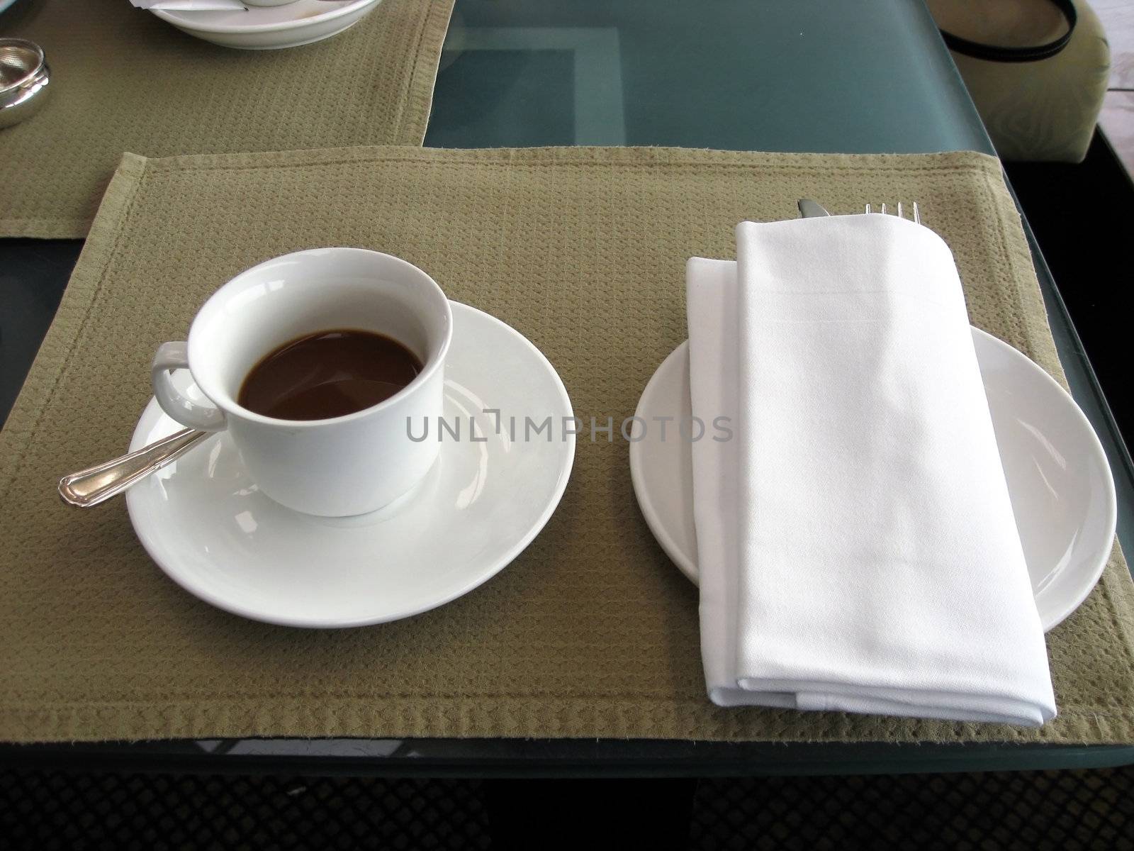 Serving coffee closeup in the lobby of a hotel