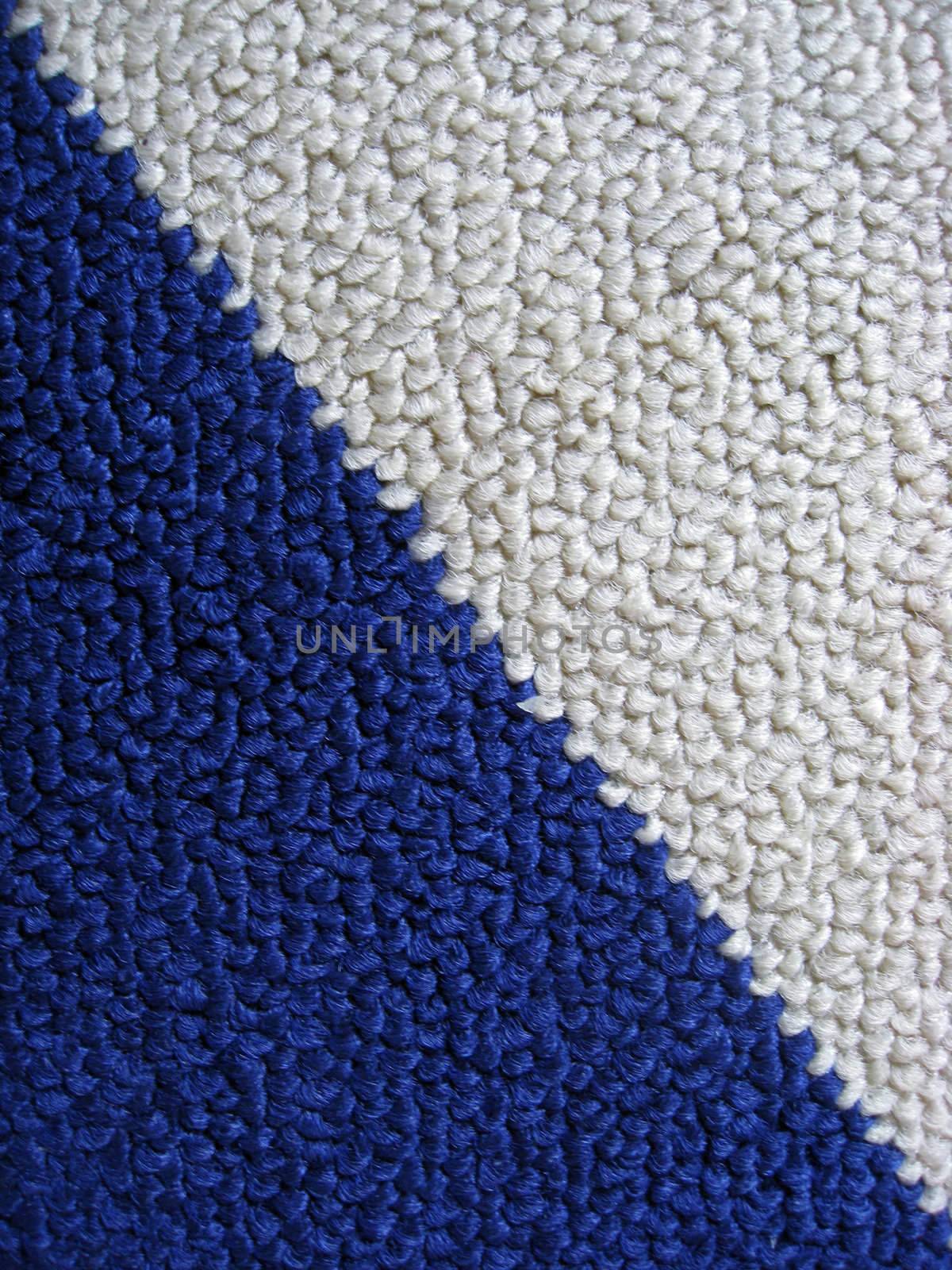 Blue and white carpet background closeup