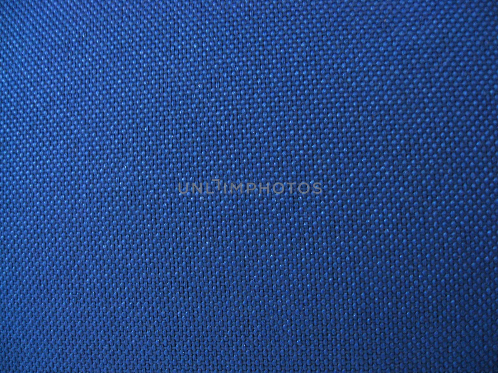 Texture of blue fabric background closeup