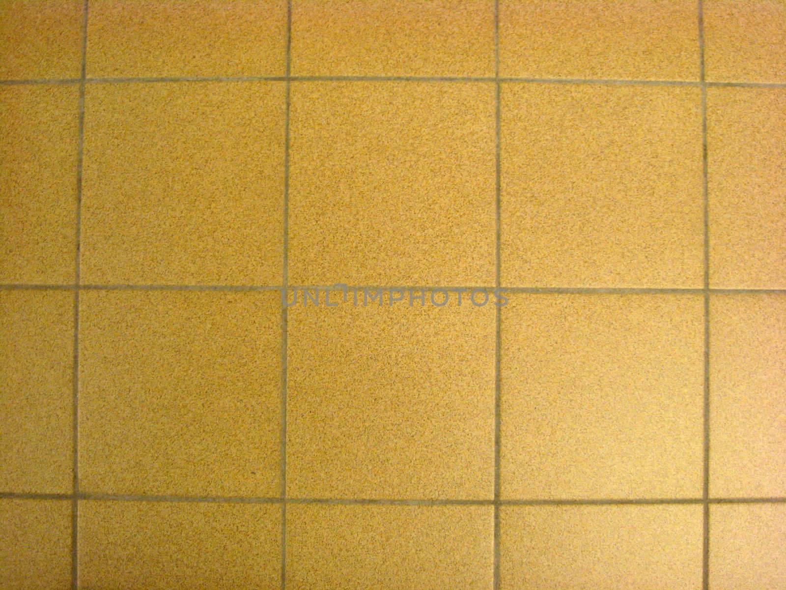 Texture of yellow stone floor background closeup