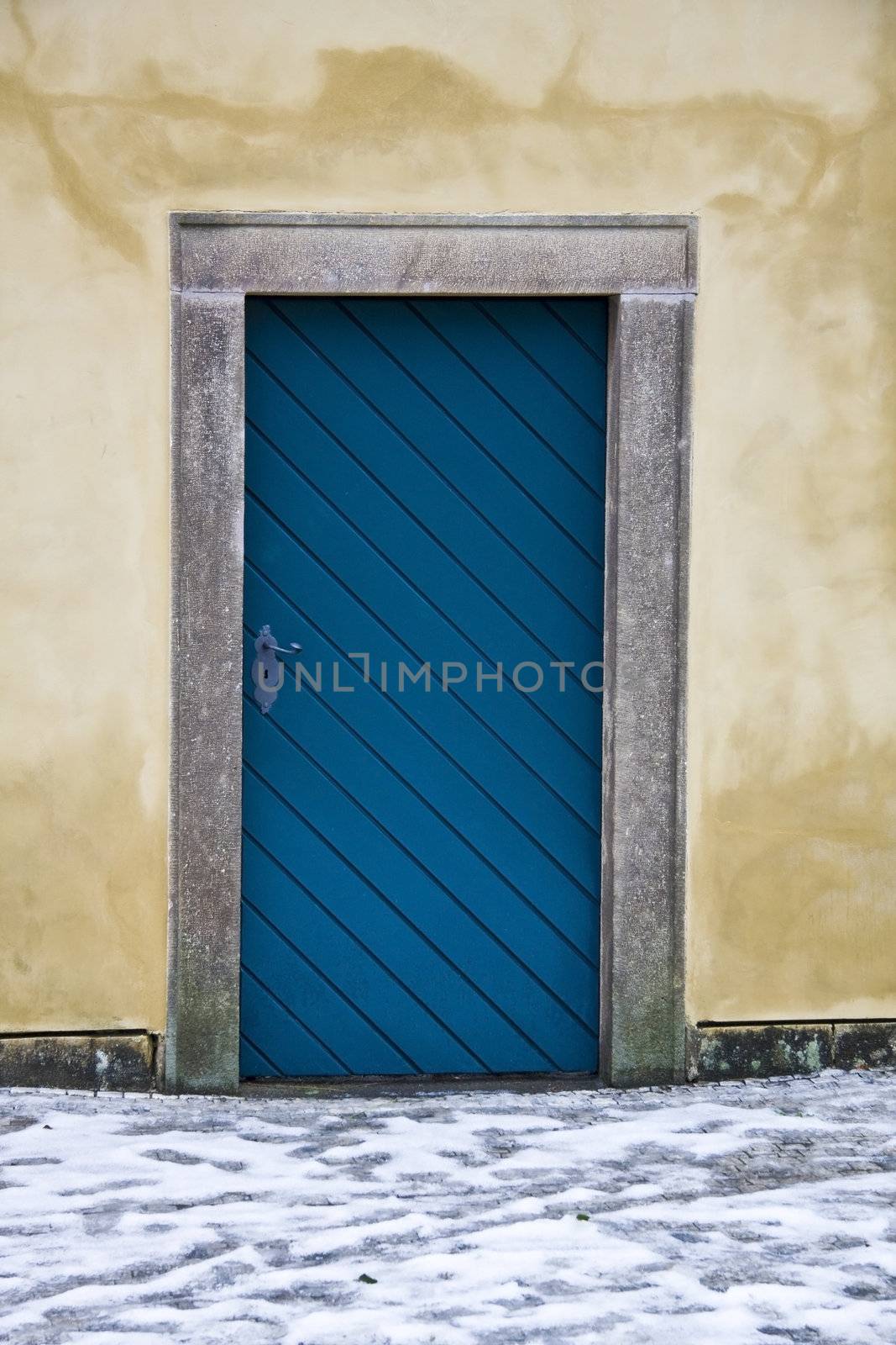 Old blue door closeup in Prague