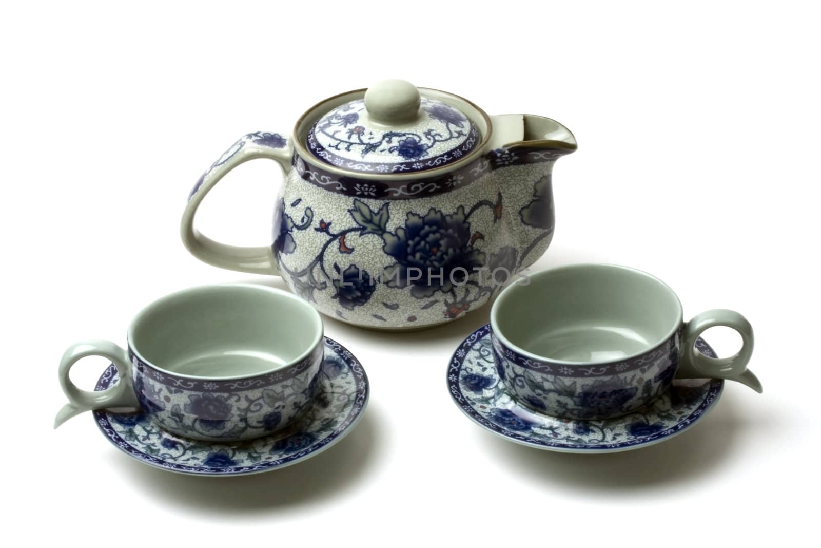 Chinese tea set with pot and cups isolated on white