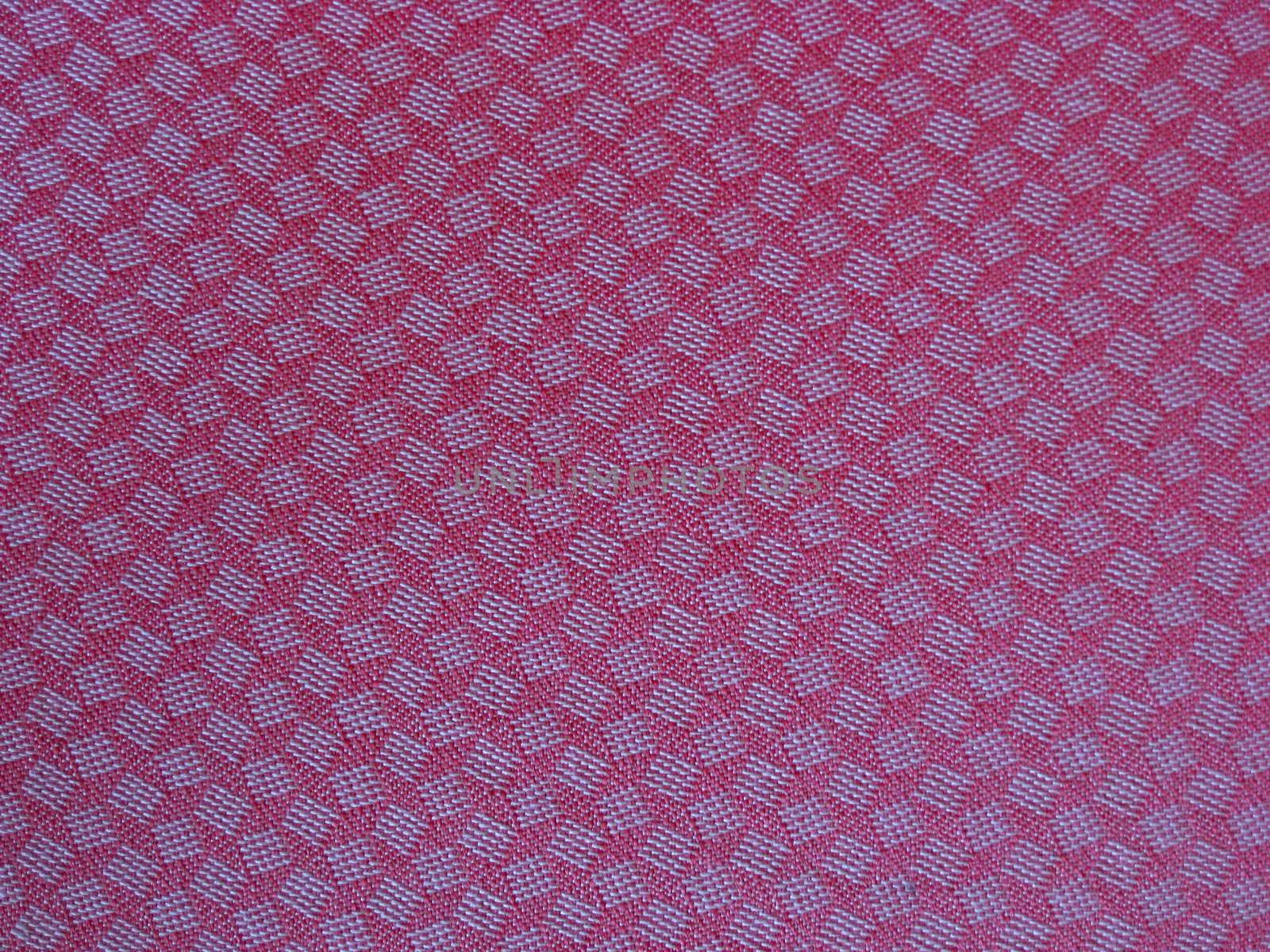 Texture of red fabric background closeup 
