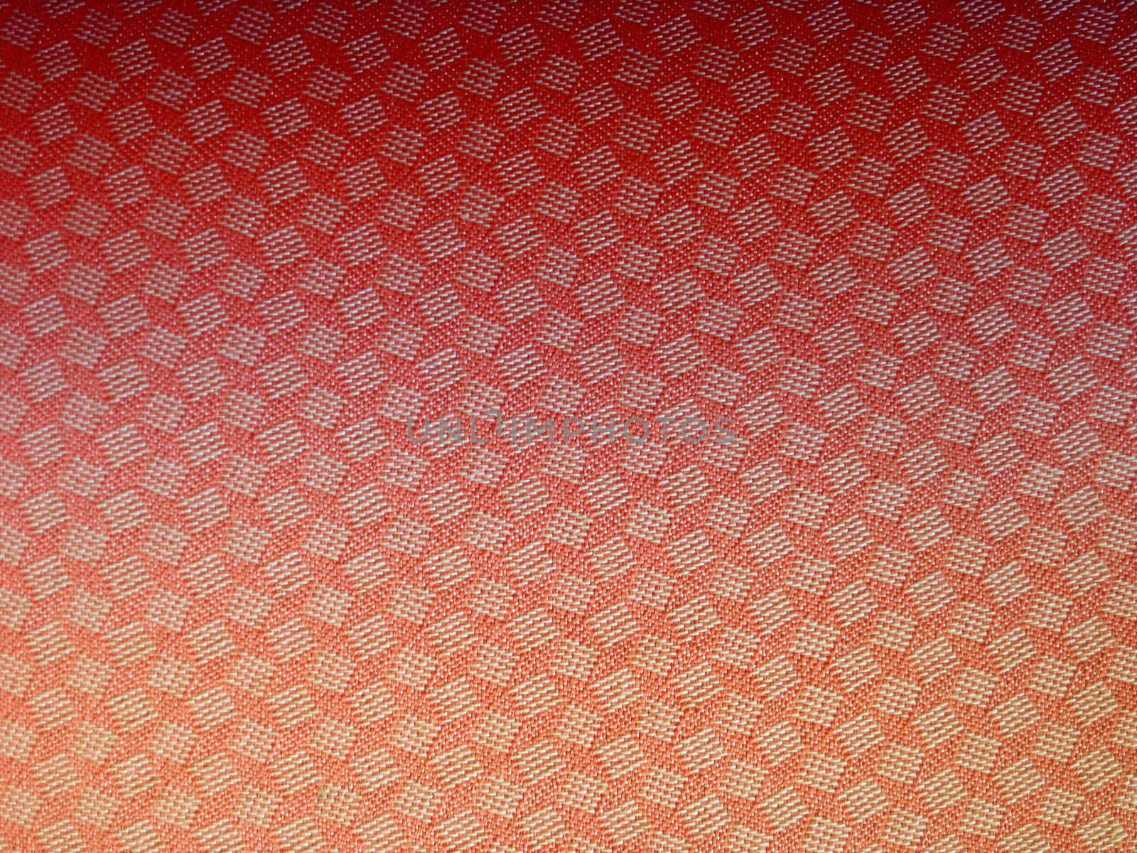 Texture of red fabric background closeup